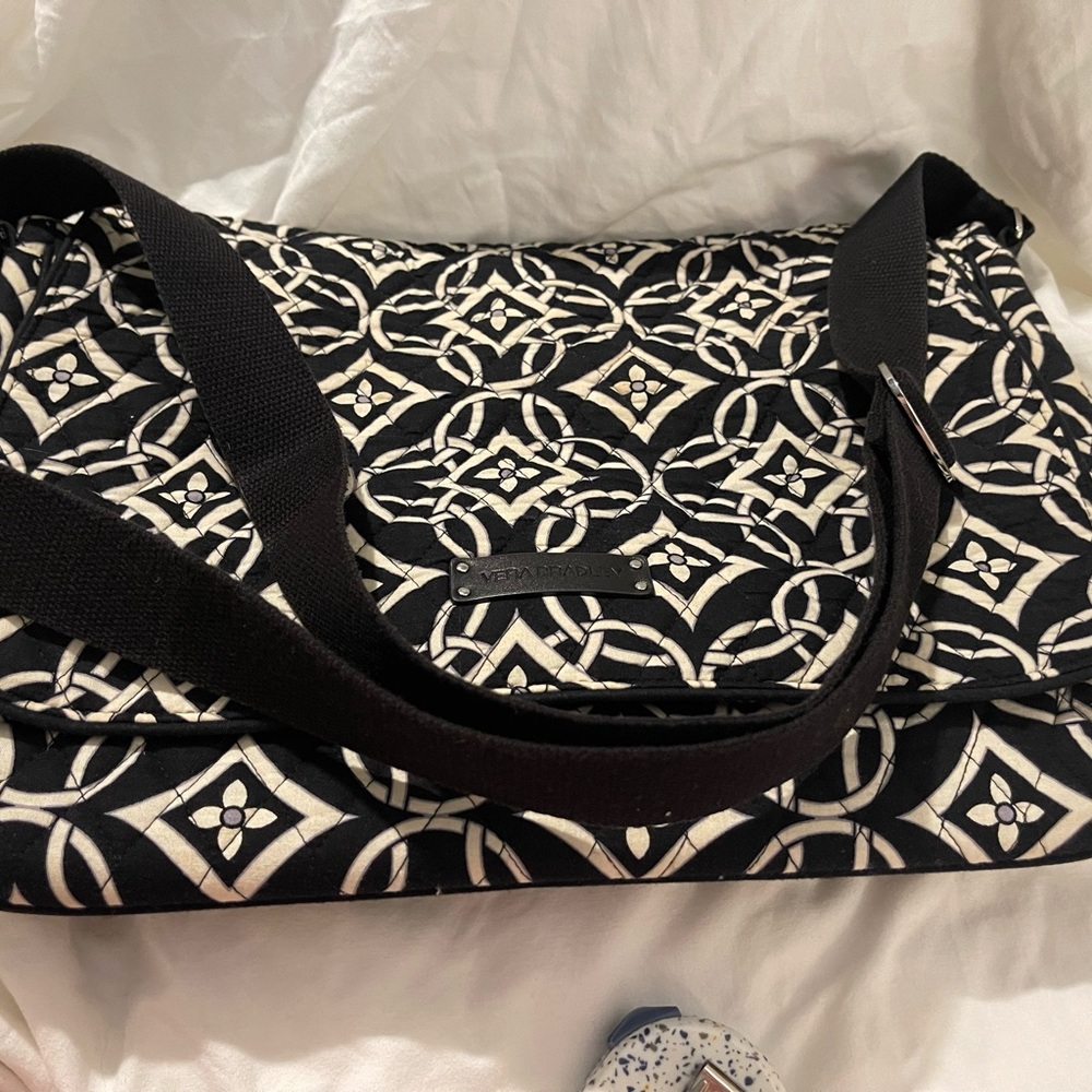 Vera Bradley Black and white messenger bag. Slightly used but in good shape.